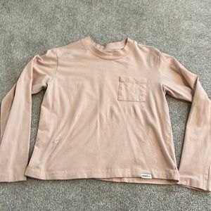 Nobull women’s heavy weight long sleeve pocket boxy tee. Dusty rose color